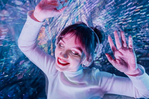 silent disco girl dancing with headphones