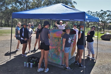 Students helping paint