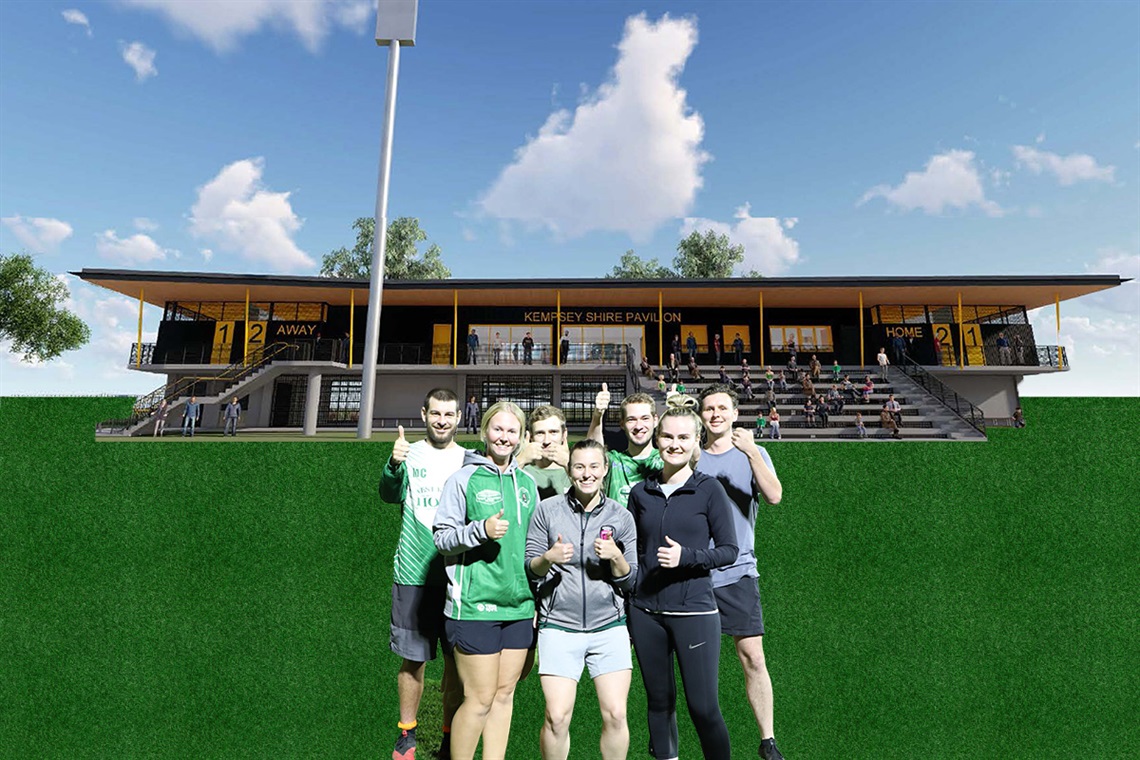 people standing in front of a new clubhouse