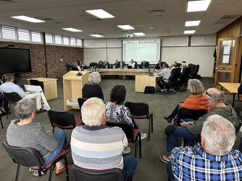 People in the public gallery during a meeting
