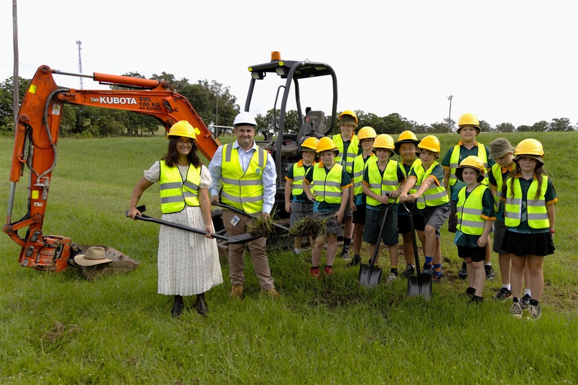 Mayor Kinne Ring, Director Utilities Wes Trotter and Students from Willawarrin Primary School turning sod at Willawarrin Water Treatment Site